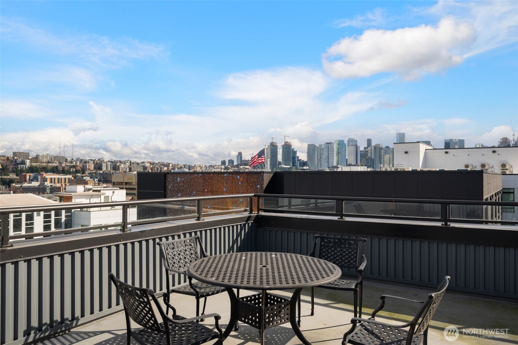 701 Galer Street, Unit 819 Seattle, WA 98109 - Photo 17 of 21 a view of a roof deck with patio