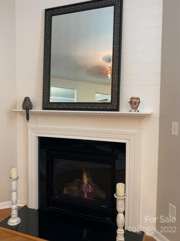 12014 Downy Birch Road, Unit 436 Charlotte, NC 28227 - Photo 14 of 26 a closeup of a fireplace with a fireplace