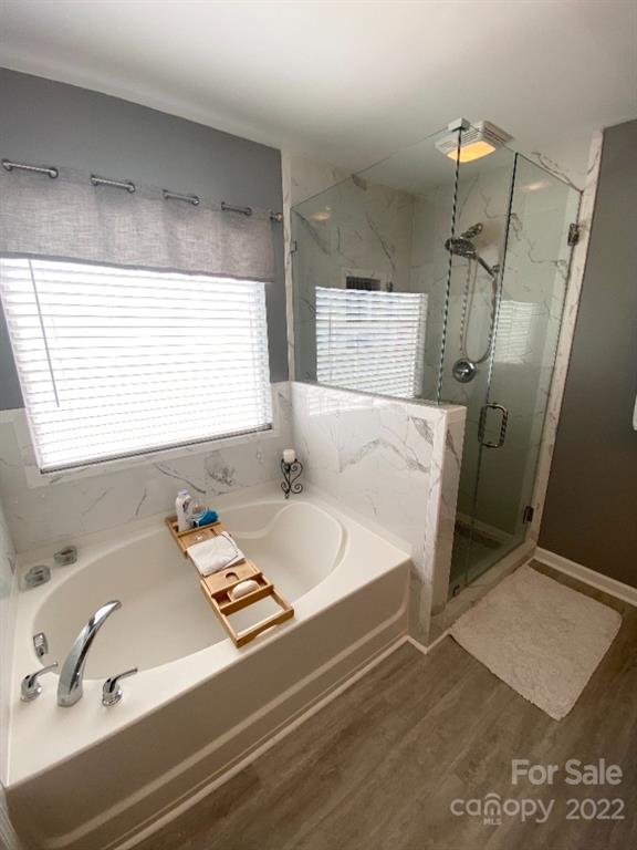 12014 Downy Birch Road, Unit 436 Charlotte, NC 28227 - Photo 24 of 26 a bath room with a window