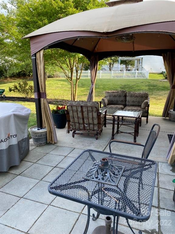 12014 Downy Birch Road, Unit 436 Charlotte, NC 28227 - Photo 3 of 26 a view of swimming pool with outdoor seating