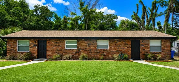 a view of a house with a garden