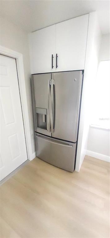 901 South Taylor Road Seffner, FL 33584 - Photo 7 of 13 a view of empty room with refrigerator