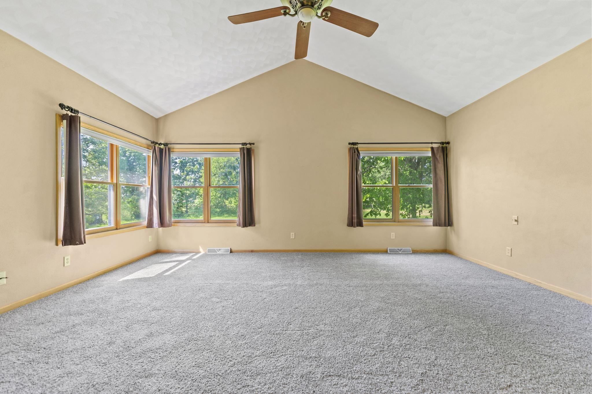 12830 Beloit Road Caledonia, IL 61011 - Photo 22 of 52 an empty room with windows