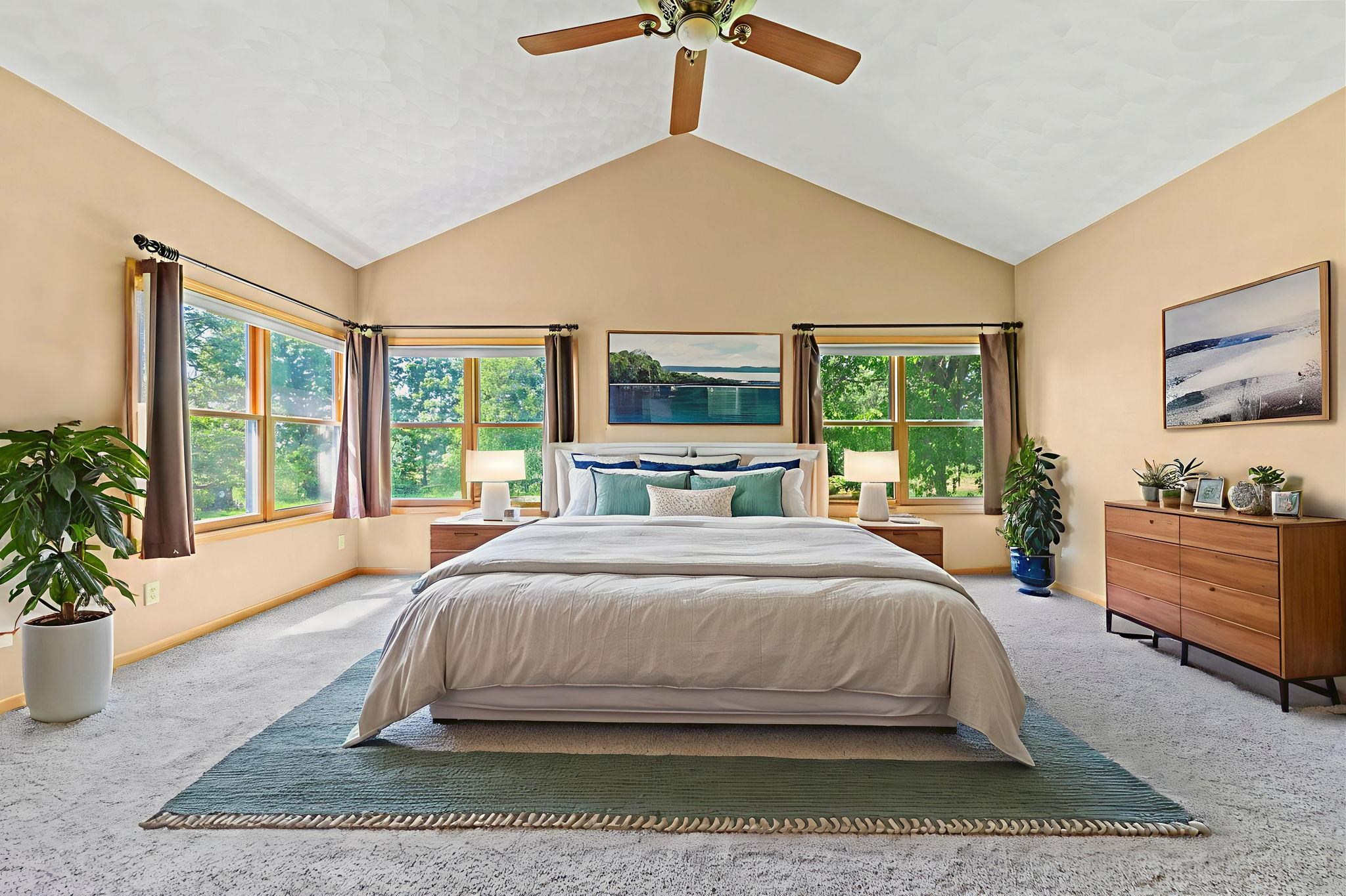 12830 Beloit Road Caledonia, IL 61011 - Photo 23 of 52 a spacious bedroom with a large bed and a window