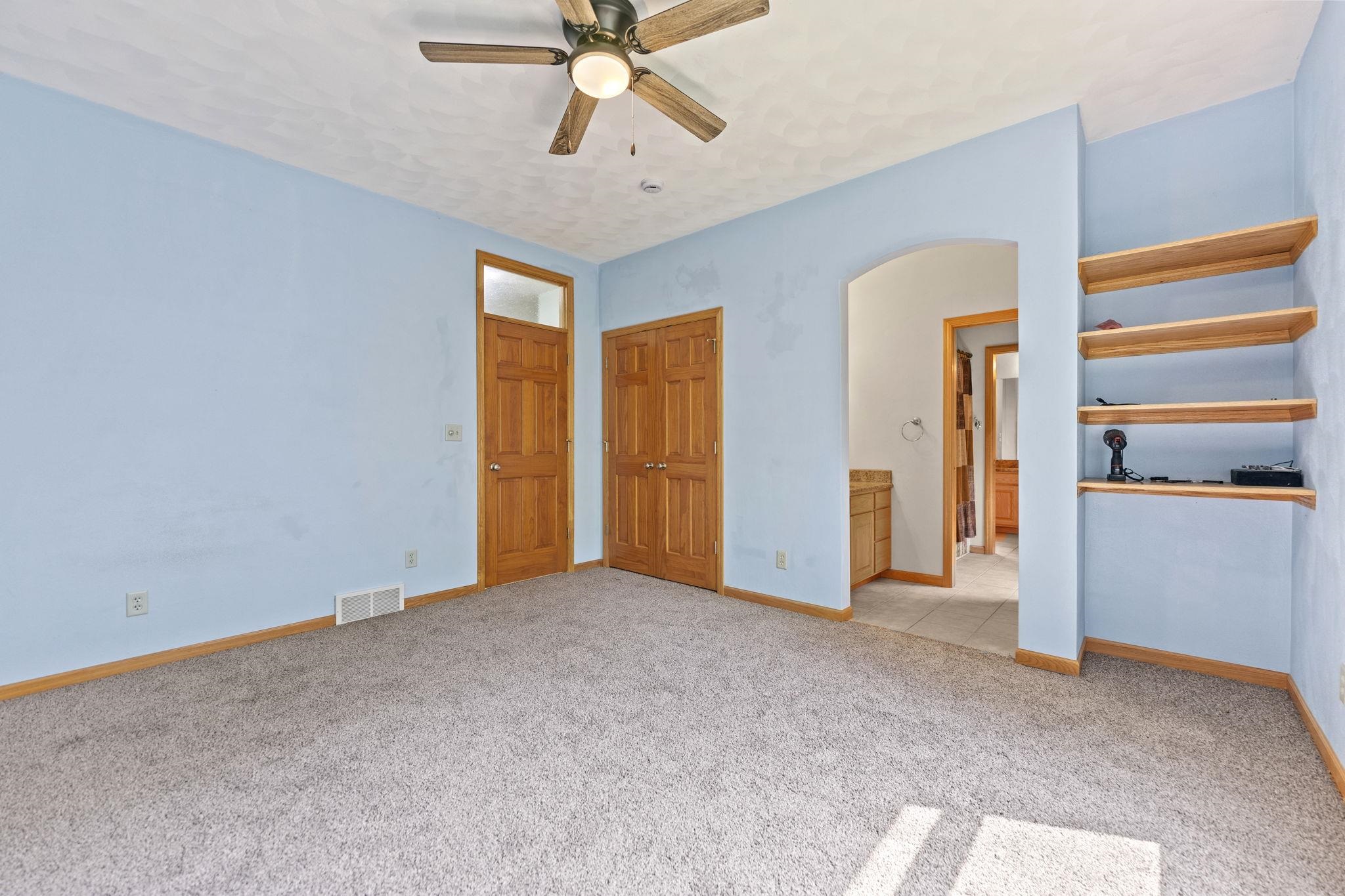 12830 Beloit Road Caledonia, IL 61011 - Photo 30 of 52 a view of an empty room with a window