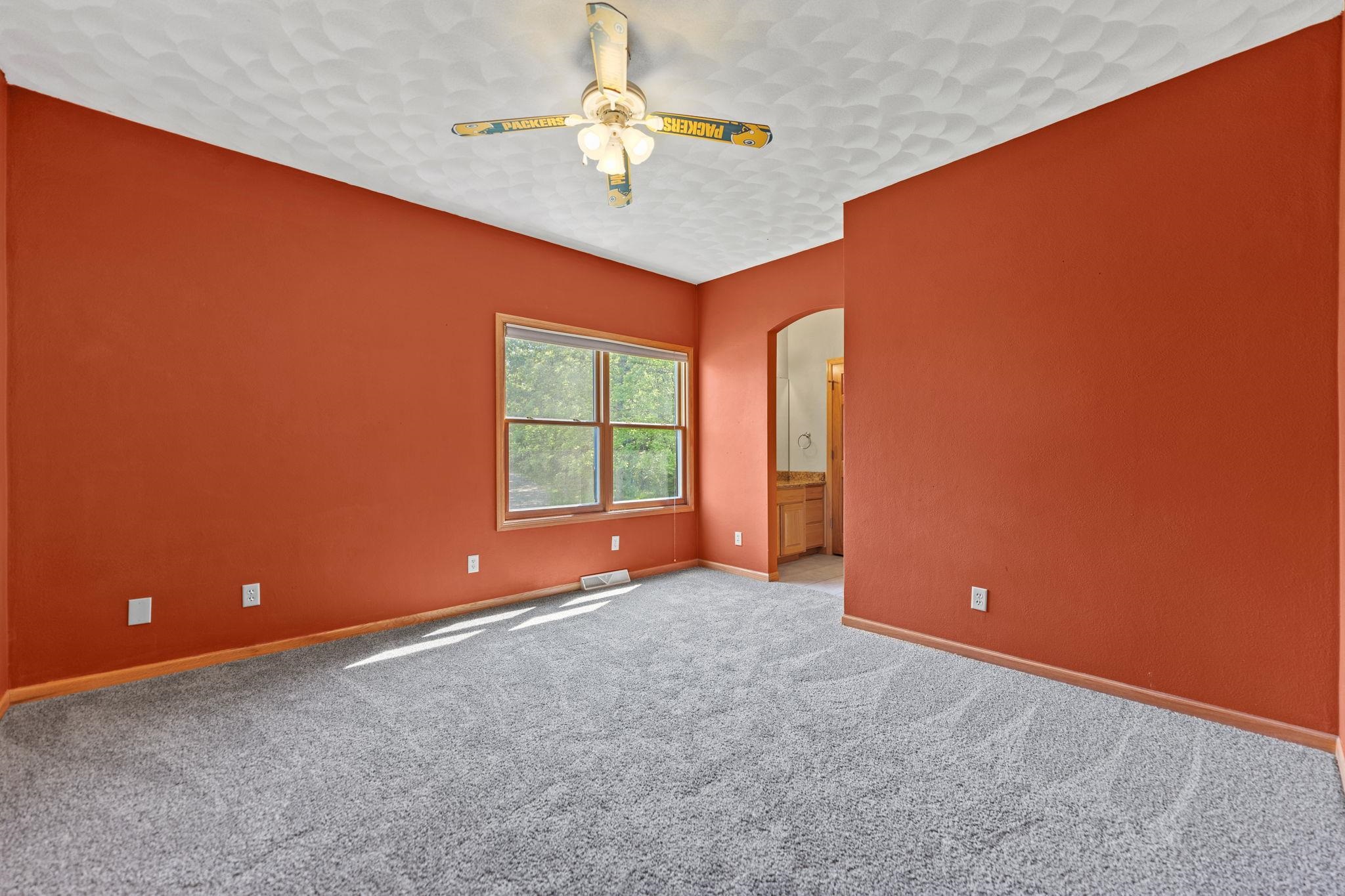 12830 Beloit Road Caledonia, IL 61011 - Photo 34 of 52 an empty room with a fan and a window