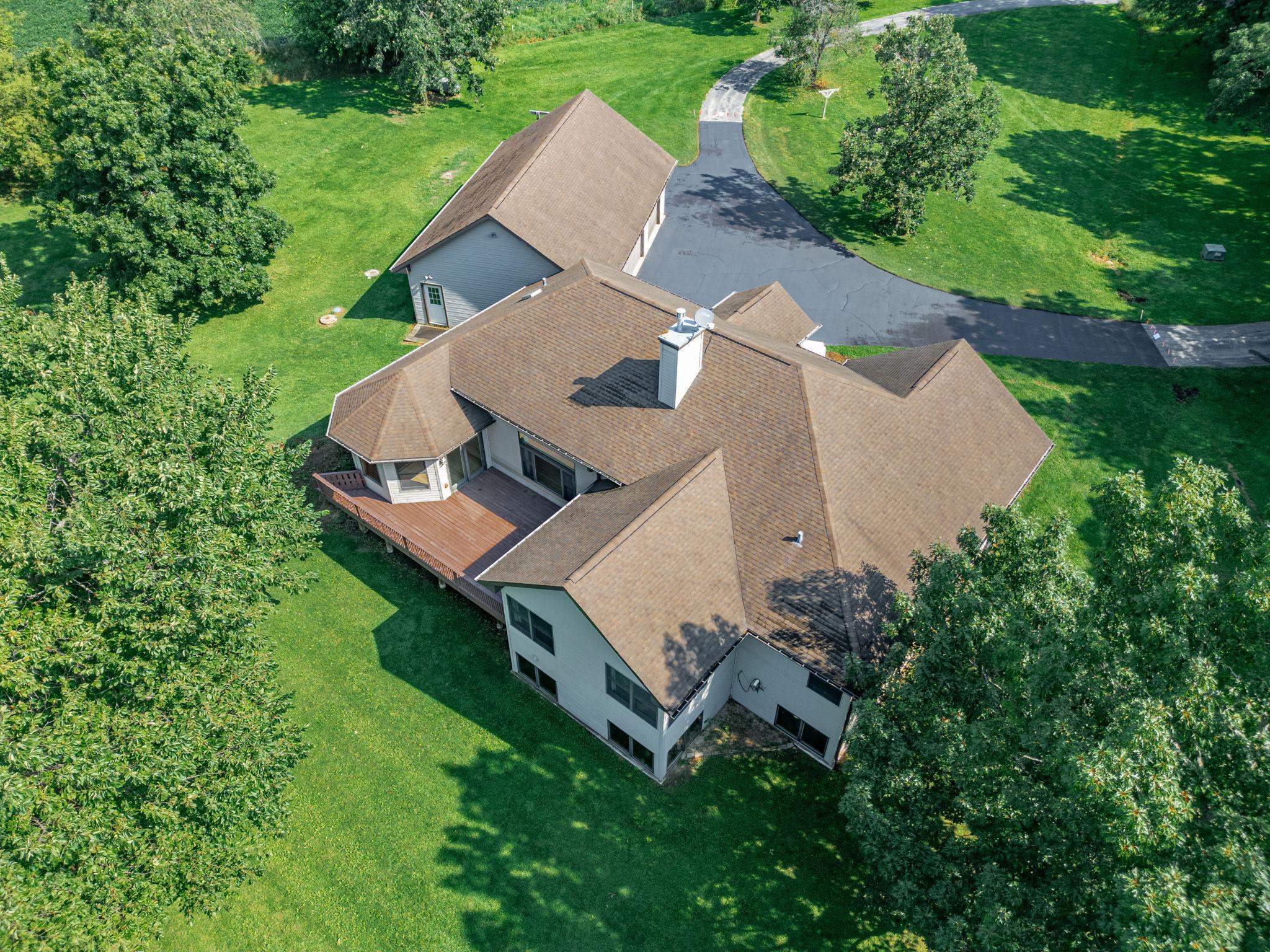12830 Beloit Road Caledonia, IL 61011 - Photo 52 of 52 an aerial view of a house with garden space and street view