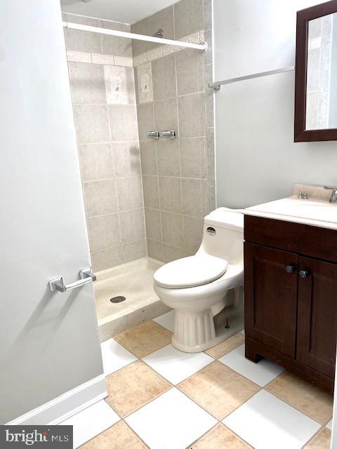 19002 Quail Valley Boulevard Gaithersburg, MD 20879 - Photo 17 of 35 a bathroom with a toilet a sink and shower