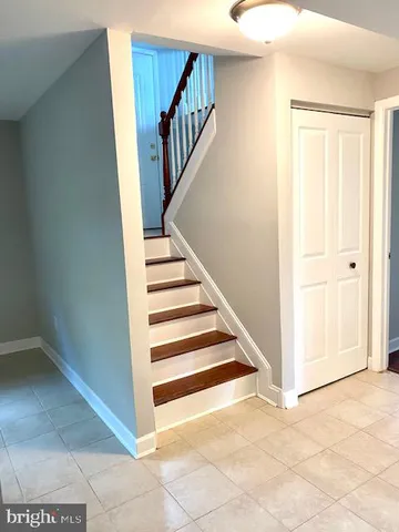 a view of lot of an empty room with a window