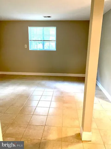 a view of an entryway and a hallway