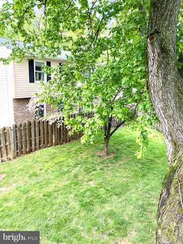 a view of deck with wooden floor and fence