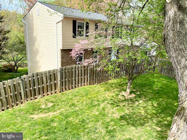 19002 Quail Valley Boulevard Gaithersburg, MD 20879 - Photo 29 of 35 a view of a house with a yard