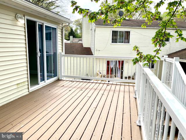 19002 Quail Valley Boulevard Gaithersburg, MD 20879 - Photo 35 of 35 a view of a house with a wooden deck