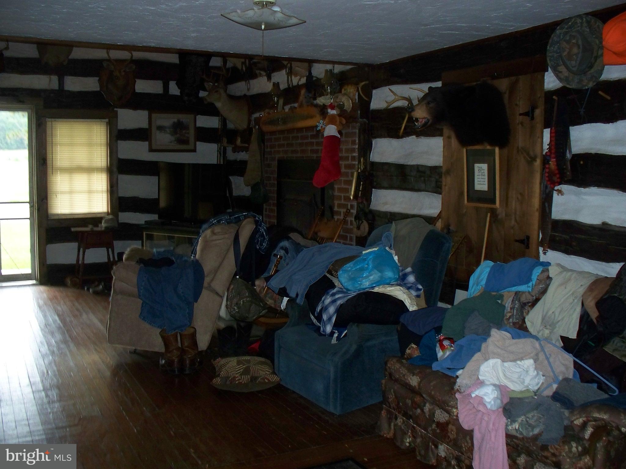 341 St Bartholomew Road Hanover, PA 17331 - Photo 18 of 44 a room with lots of different colored cloths