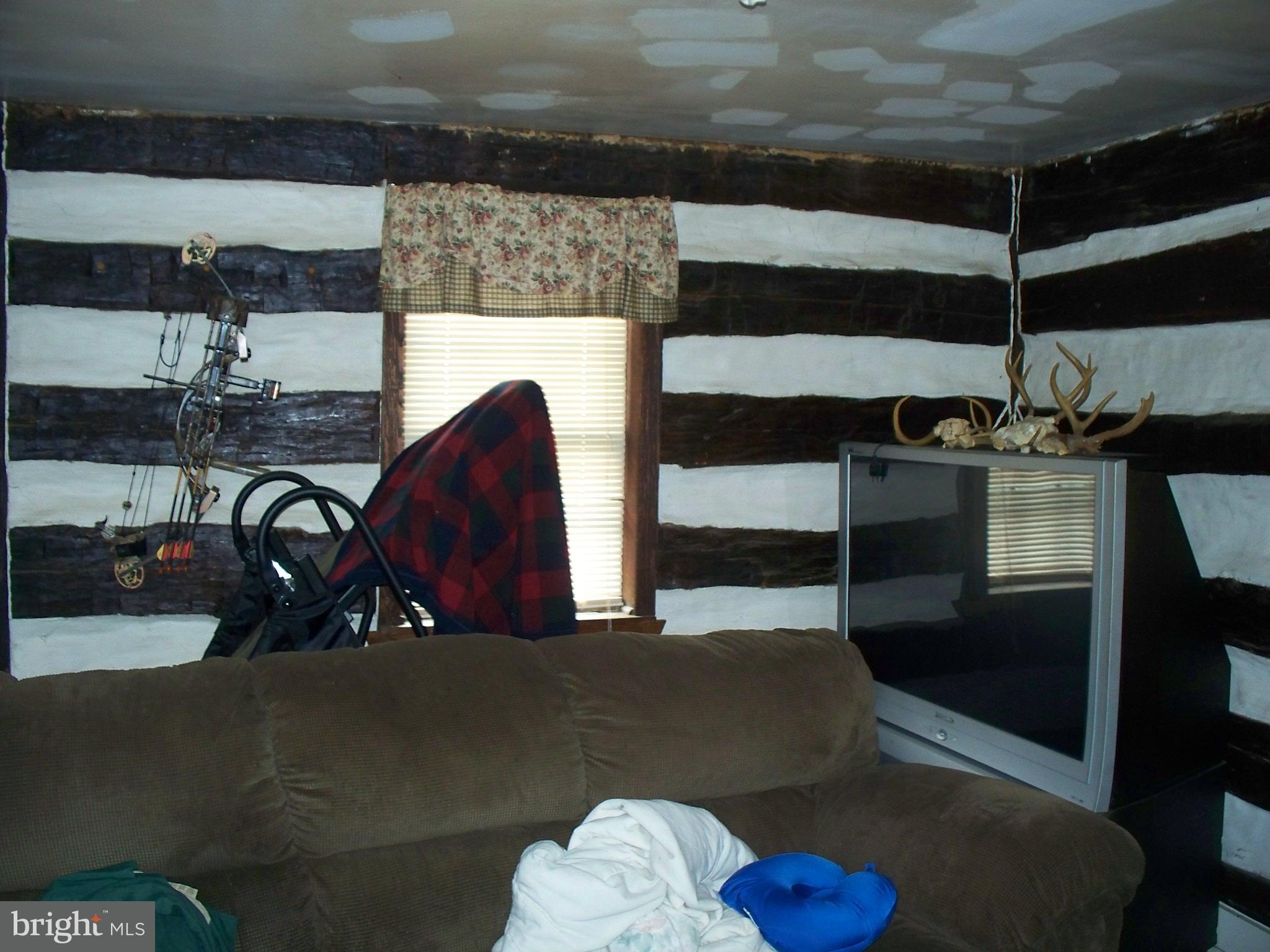 341 St Bartholomew Road Hanover, PA 17331 - Photo 23 of 44 a living room with chairs and a table