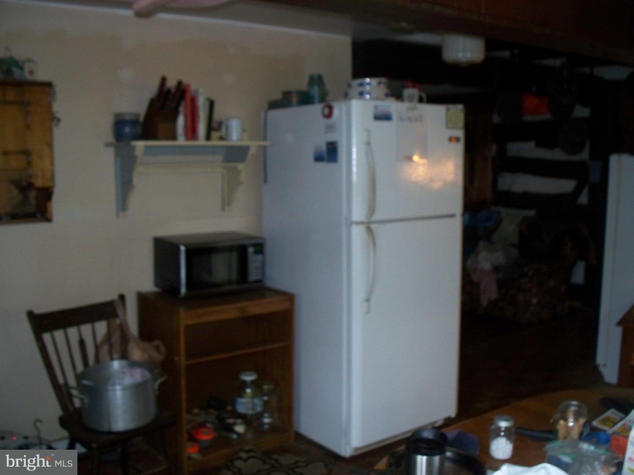 341 St Bartholomew Road Hanover, PA 17331 - Photo 31 of 44 a white refrigerator freezer sitting in a kitchen