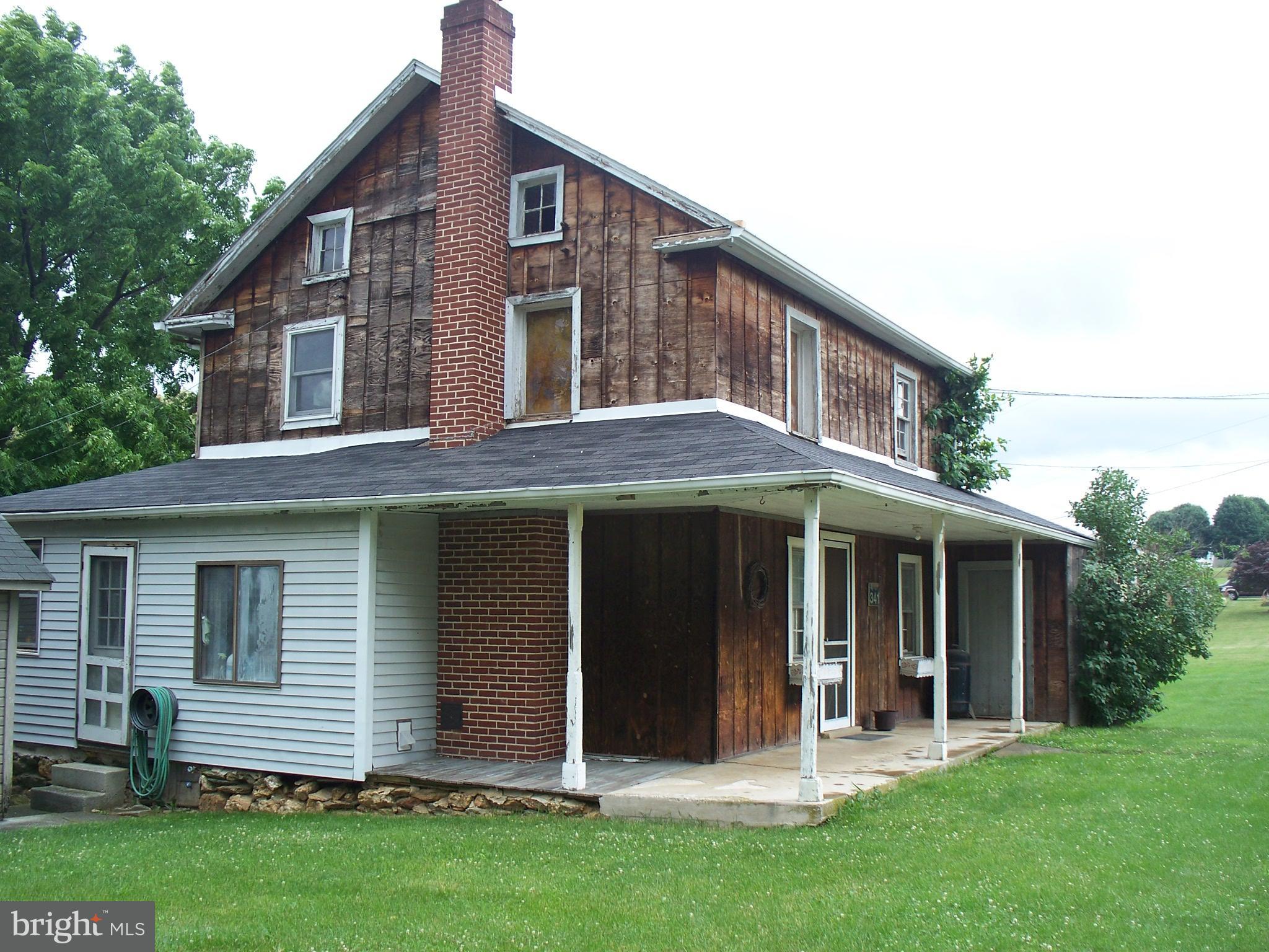 341 St Bartholomew Road Hanover, PA 17331 - Photo 5 of 44 a front view of a house with a yard