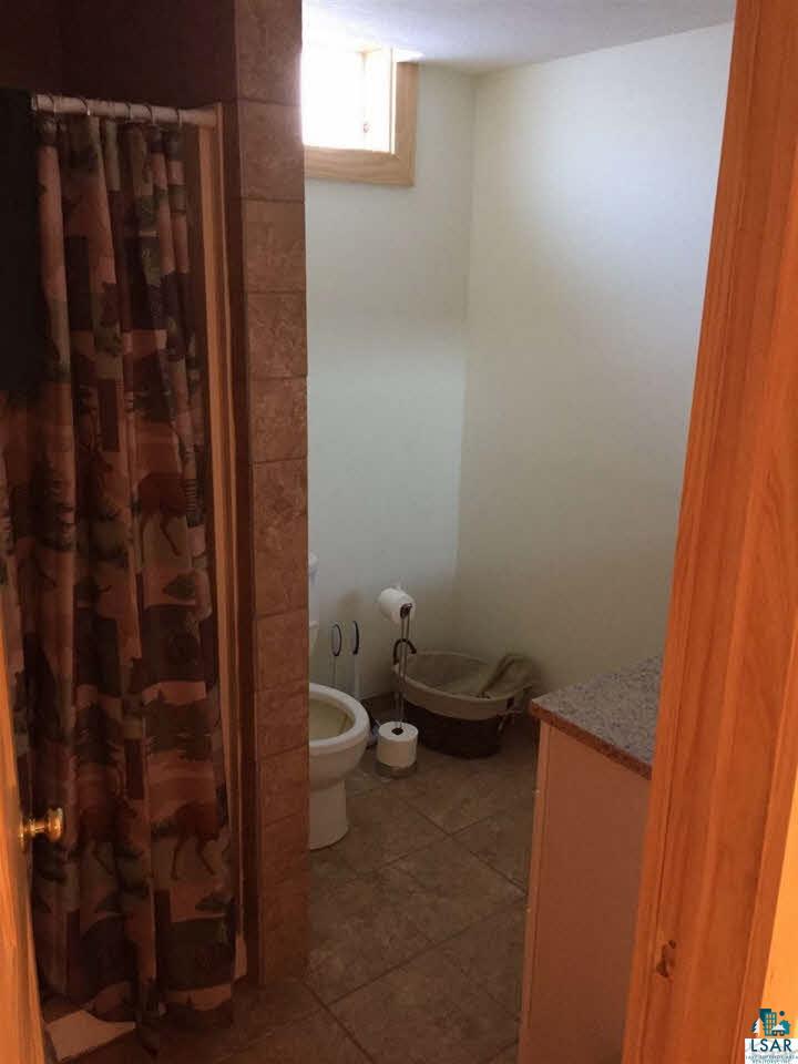 8141 Middle Road Minong, WI 54859 - Photo 20 of 25 Lower Level Bath. In Floor heat.
