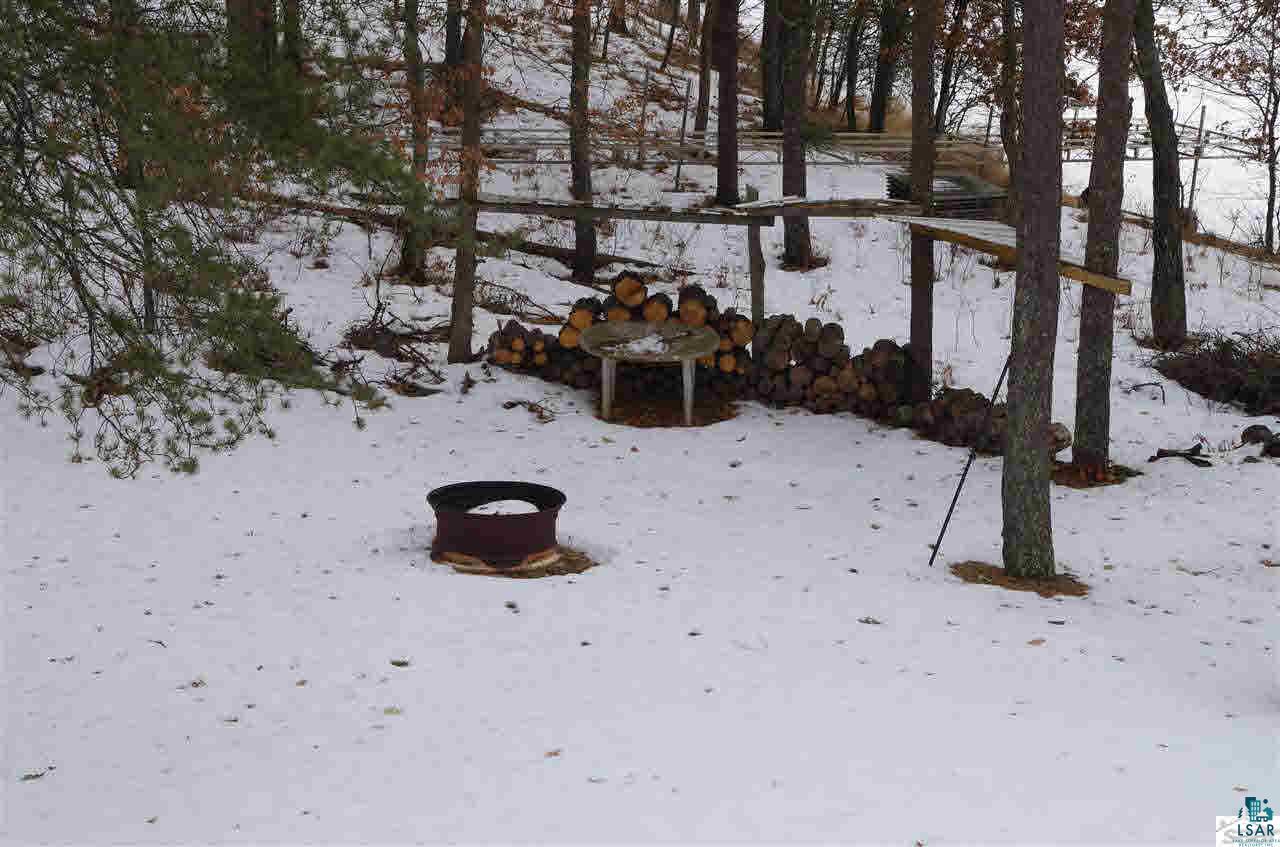 8141 Middle Road Minong, WI 54859 - Photo 25 of 25 Deck View of the fire pit.