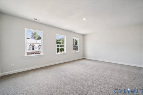 an empty room with windows