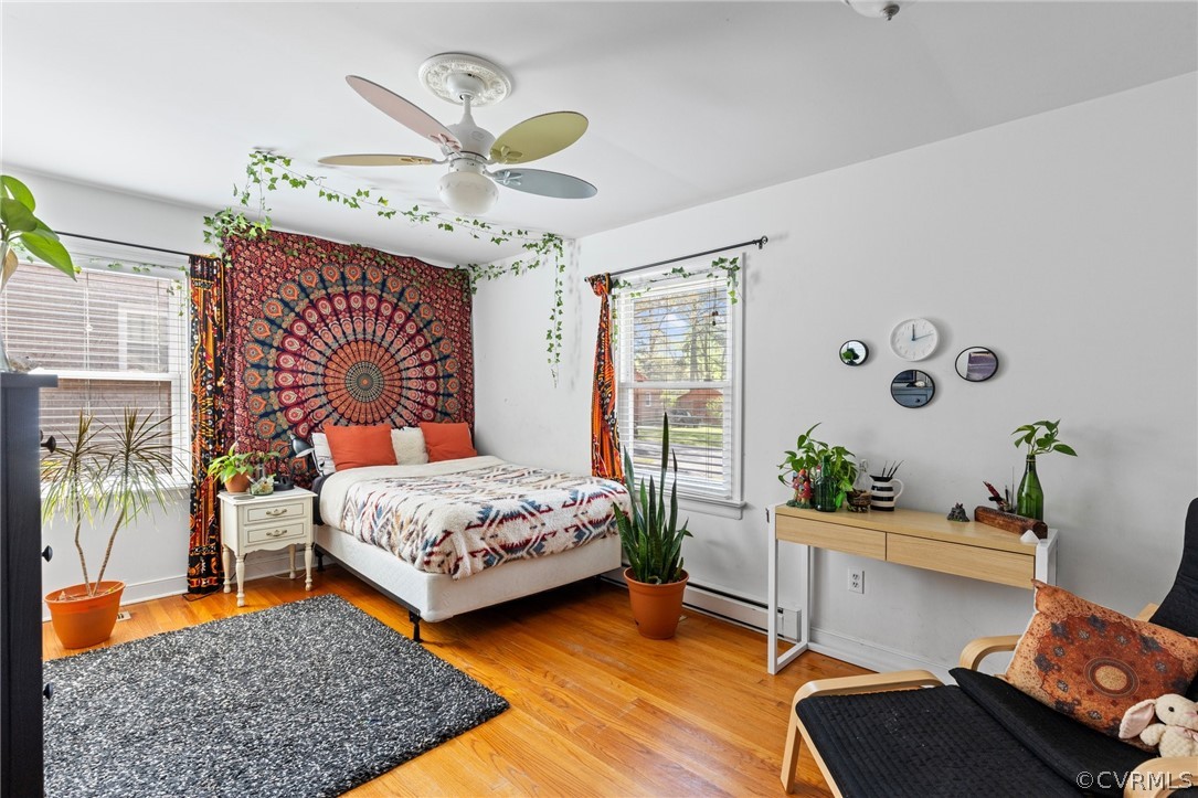 4840 Vestry Road North Chesterfield, VA 23237 - Photo 15 of 38 a bedroom with a bed and ceiling fan