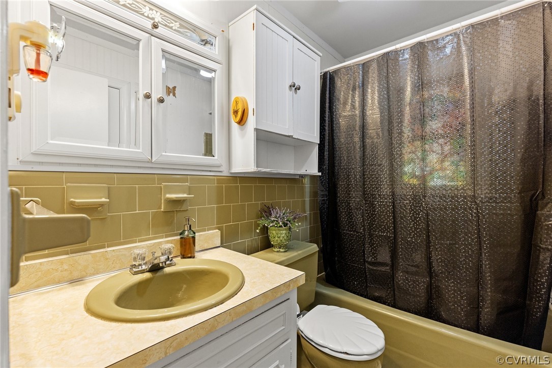 4840 Vestry Road North Chesterfield, VA 23237 - Photo 16 of 38 a bathroom with a sink toilet and shower