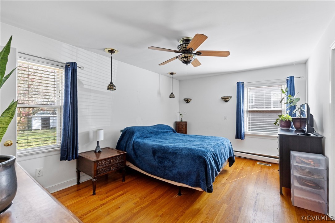 4840 Vestry Road North Chesterfield, VA 23237 - Photo 17 of 38 a bedroom with a bed dresser and a window