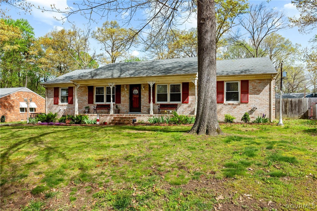 4840 Vestry Road North Chesterfield, VA 23237 - Photo 26 of 38 a front view of house with yard and green space
