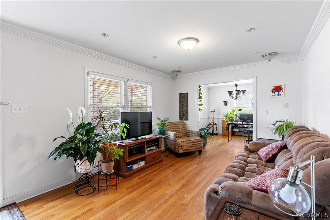 4840 Vestry Road North Chesterfield, VA 23237 - Photo 28 of 38 a living room with furniture potted plant and a window