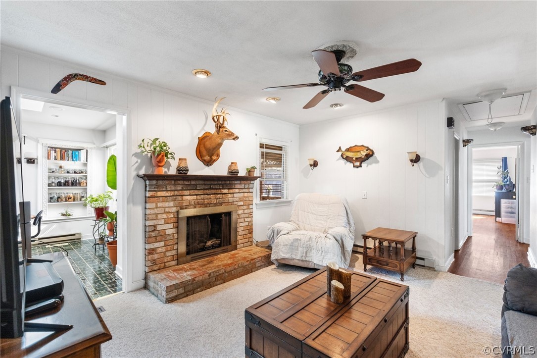 4840 Vestry Road North Chesterfield, VA 23237 - Photo 30 of 38 a living room with furniture and a fireplace