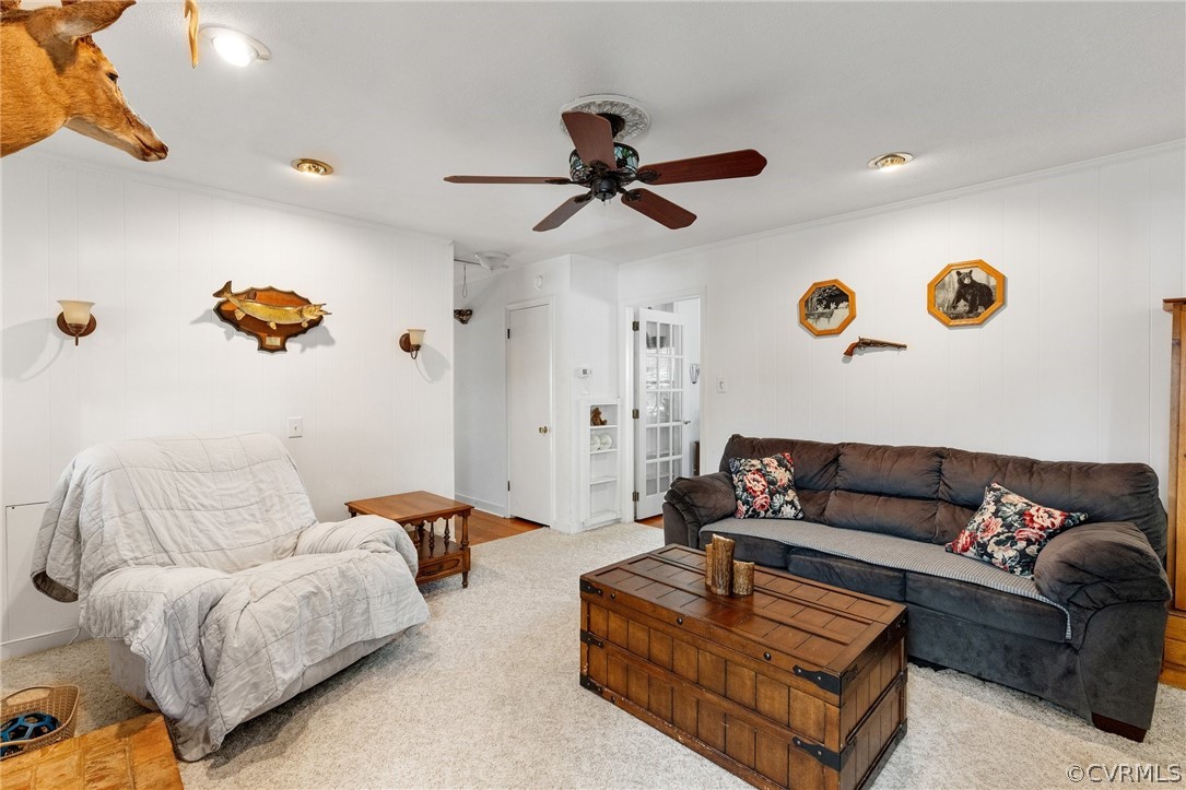 4840 Vestry Road North Chesterfield, VA 23237 - Photo 31 of 38 a living room with furniture and a ceiling fan