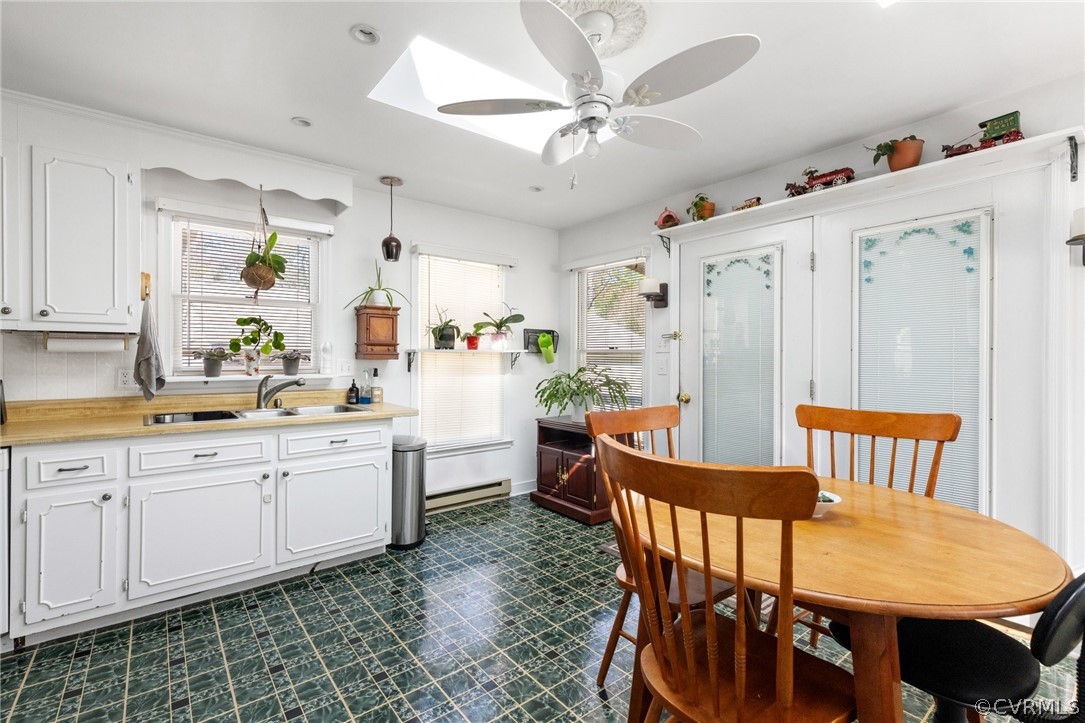 4840 Vestry Road North Chesterfield, VA 23237 - Photo 33 of 38 a view of a dining room with furniture and chandelier