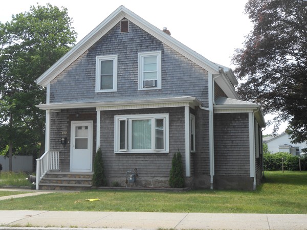 777 New Boston Road Fall River, MA 02720 - Photo 2 of 13 a front view of a house with a yard