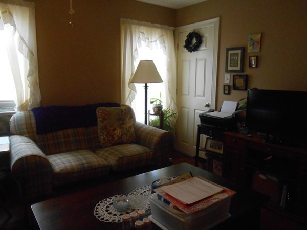 777 New Boston Road Fall River, MA 02720 - Photo 5 of 13 a living room with furniture and a window