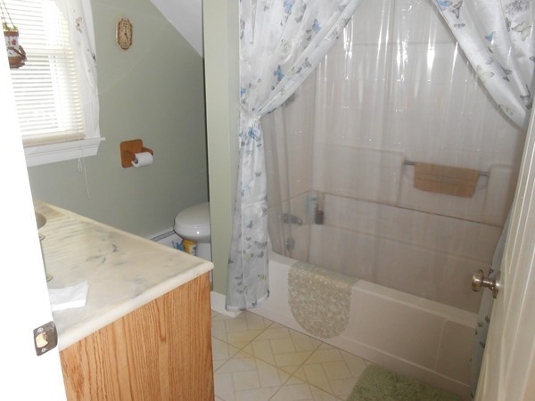777 New Boston Road Fall River, MA 02720 - Photo 7 of 13 a bathroom with a sink a toilet and shower