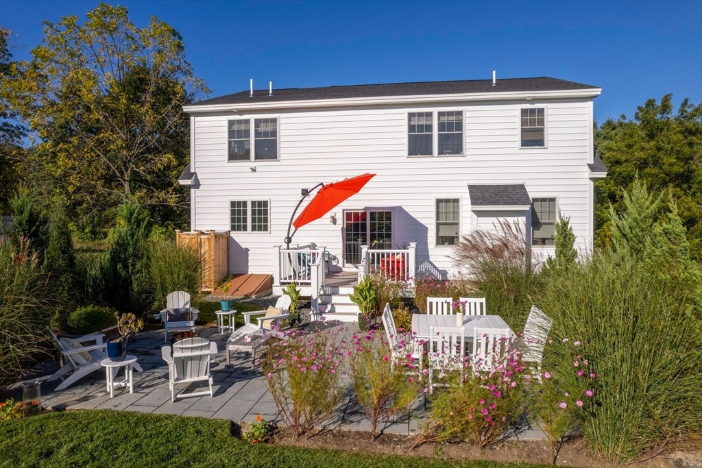 5 John West Road Exeter, NH 03833 - Photo 26 of 33 a front view of a house with garden