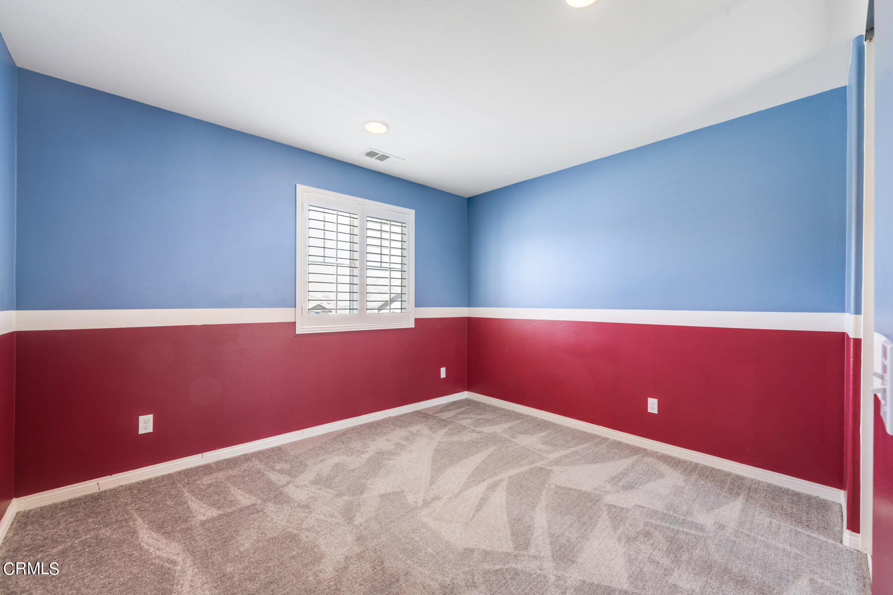 7332 Blue Oak Road Riverside, CA 92507 - Photo 17 of 30 an empty room with wooden floor and windows