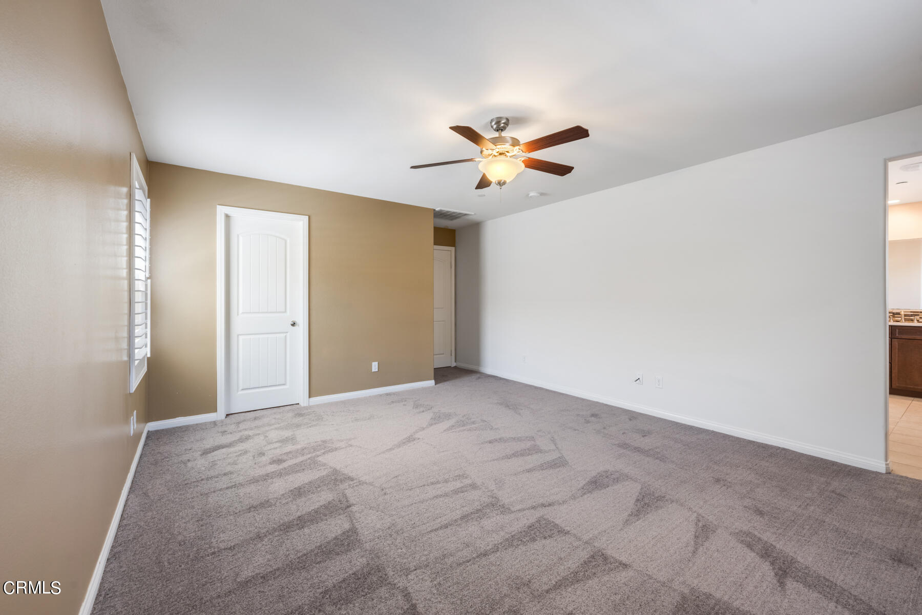 7332 Blue Oak Road Riverside, CA 92507 - Photo 22 of 30 a view of empty room with a ceiling fan