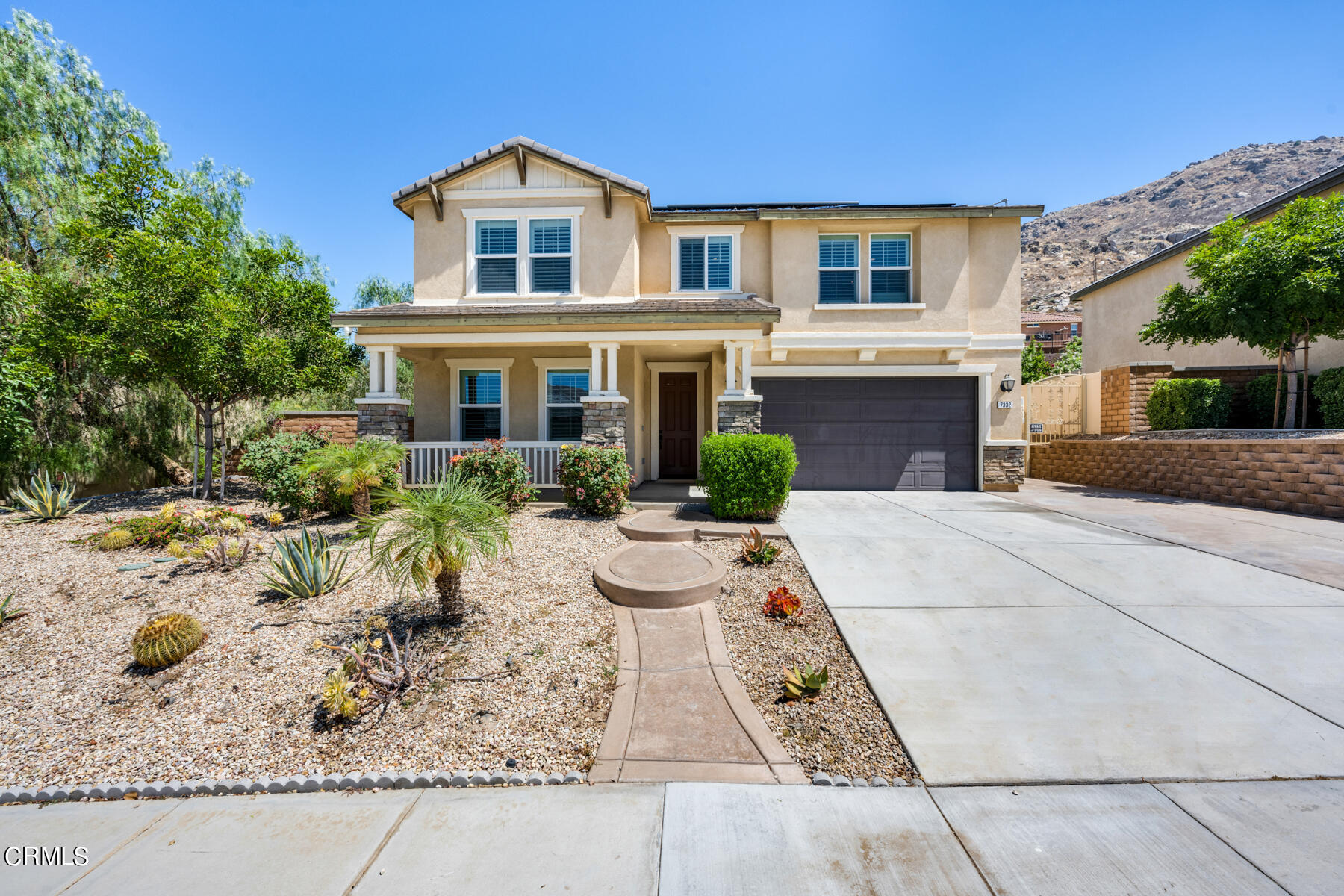 7332 Blue Oak Road Riverside, CA 92507 - Photo 4 of 30 a front view of a house with garden