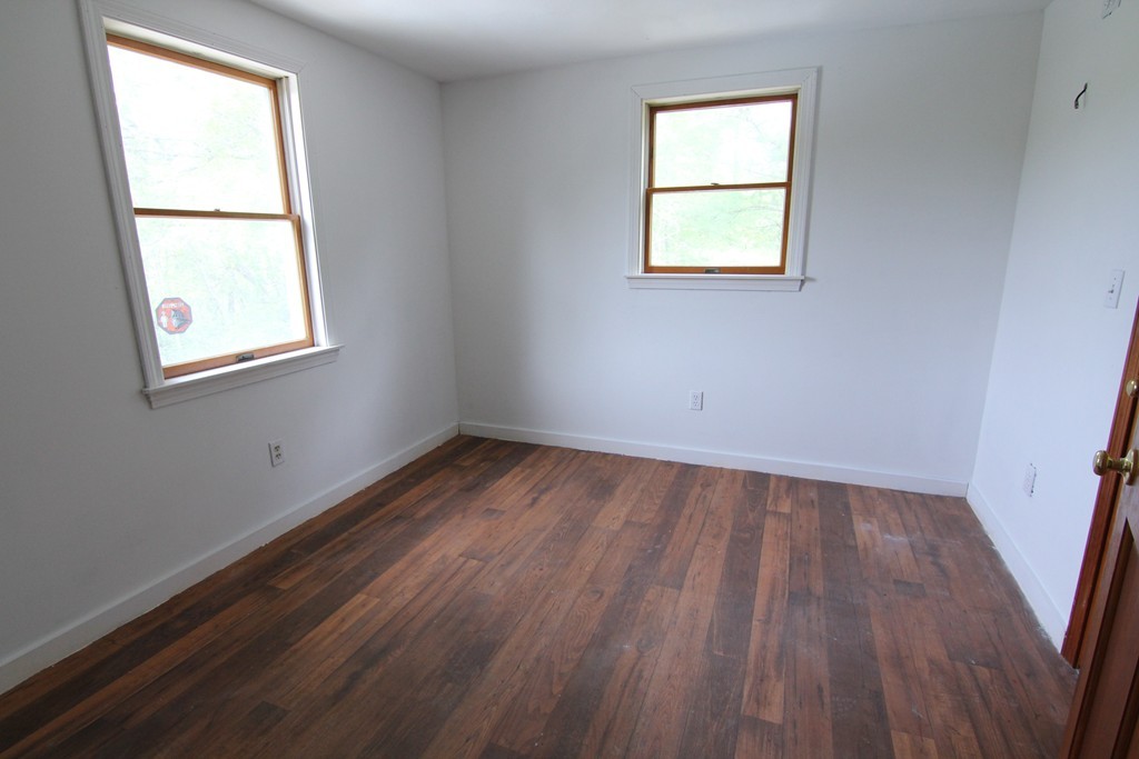 54 Middle Road Newbury, MA 01951 - Photo 8 of 13 an empty room with a window