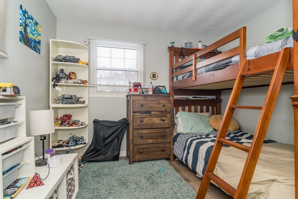 17 Francine Road Framingham, MA 01701 - Photo 12 of 14 a bedroom with a bed and furniture