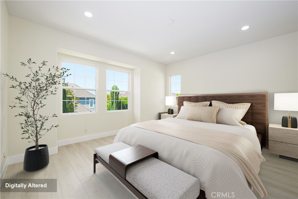 15 Plum Street Ladera Ranch, CA 92694 - Photo 53 of 113 a bedroom with a bed and a potted plant