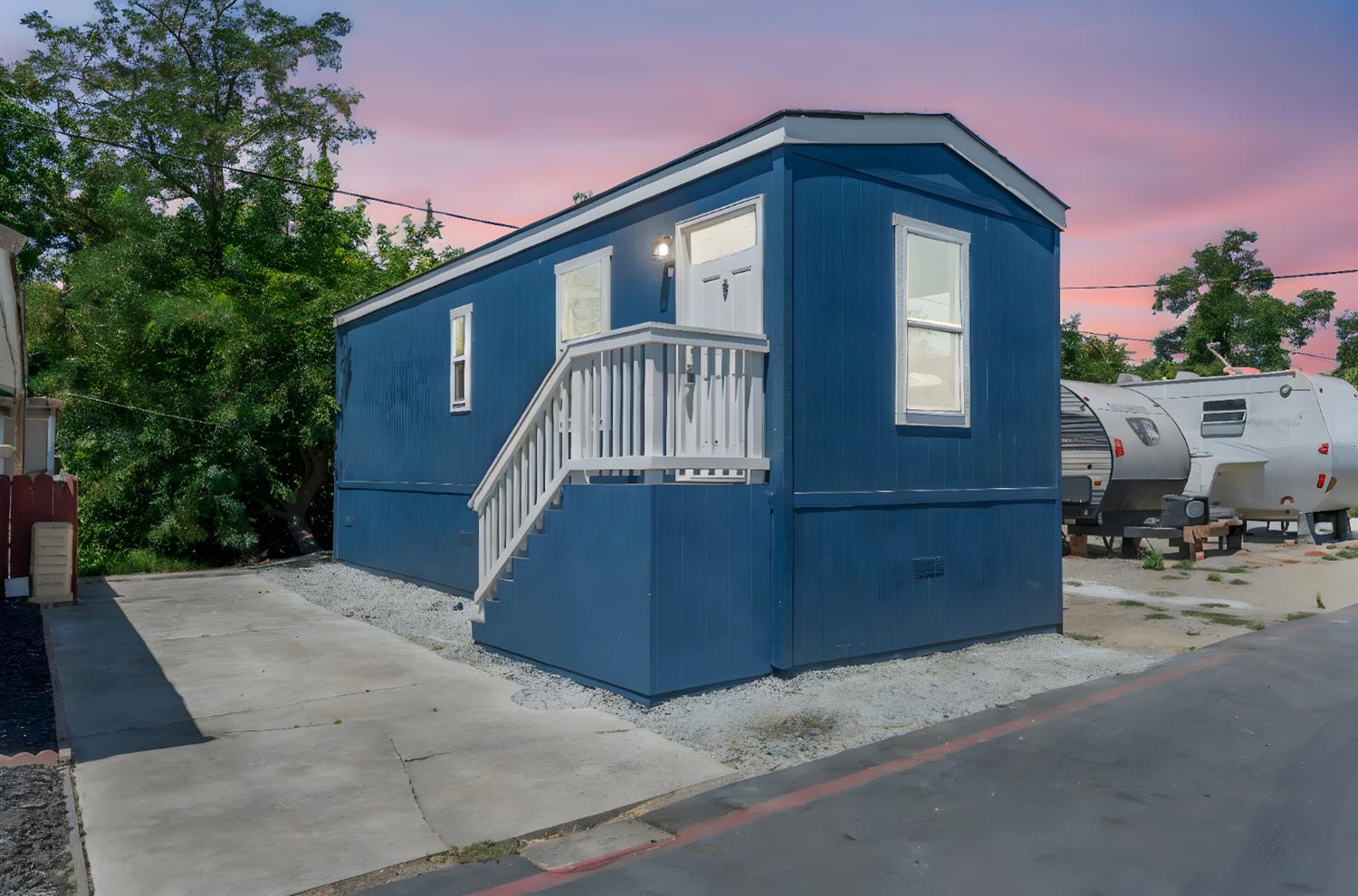 a front view of a house with parking