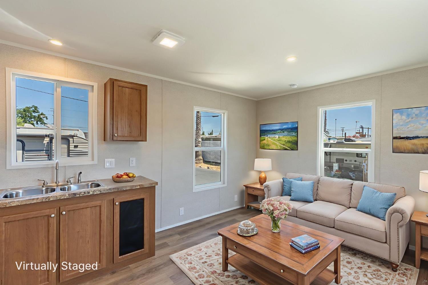 4610 Gateway Road, Unit 19 Bethel Island, CA 94511 - Photo 13 of 15 Please note that the image shown is a virtually staged representation of the room and is intended to provide a visual concept of the space. The actual room may differ in appearance, and the furniture and decor depicted are not included in the sale. For an accurate understanding of the property's current condition and layout, we encourage you to view the home in person. Thank you