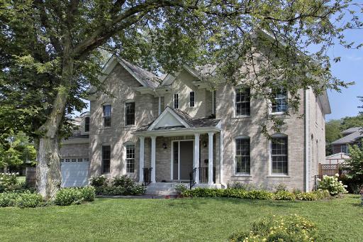 606 Locust Road Wilmette, IL 60091 - Photo 1 of 13 front view of a house with a yard