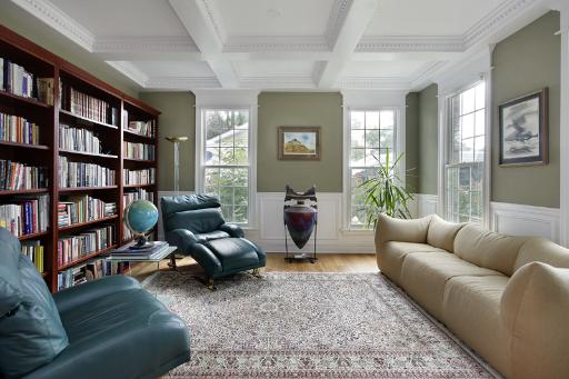606 Locust Road Wilmette, IL 60091 - Photo 2 of 13 a living room with furniture and a book shelf