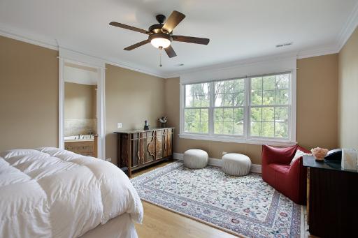 606 Locust Road Wilmette, IL 60091 - Photo 7 of 13 a bedroom with a bed and window