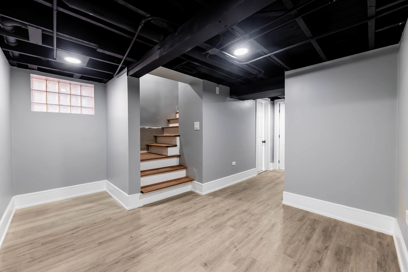 8817 South Morgan Street Chicago, IL 60620 - Photo 28 of 37 a view of an empty room with stairs and ventilation