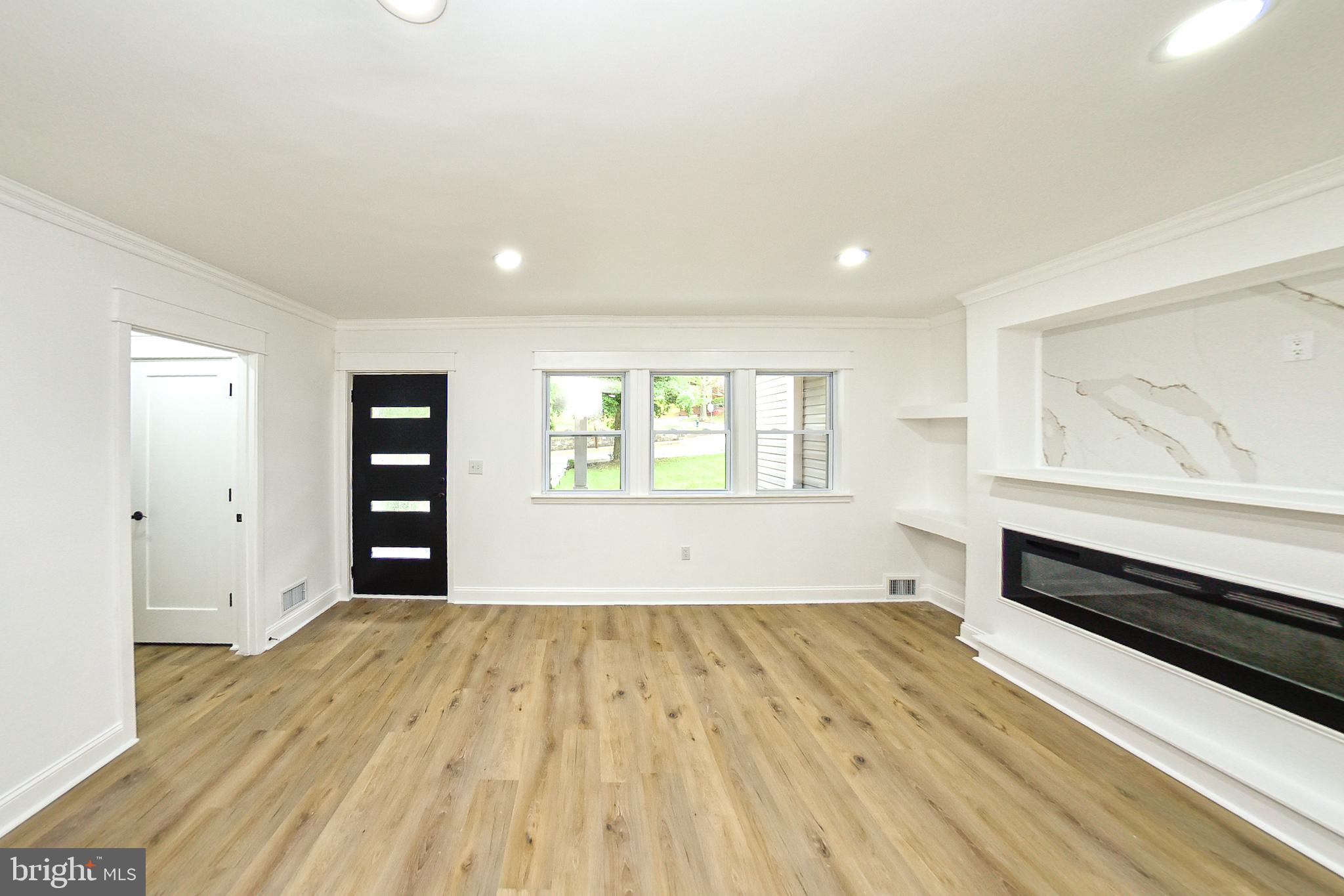 3704 Suitland Road Southeast Washington, DC 20020 - Photo 20 of 70 a view of an empty room with a window
