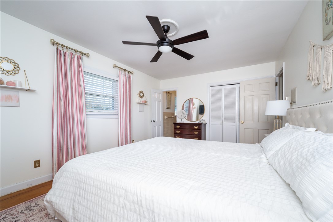 401 South Glassy Mountain Road Pickens, SC 29671 - Photo 14 of 37 This airy bedroom offers comfortable living with elegant finishes and abundant light.